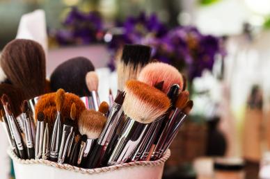 Makeup brushes in a cup