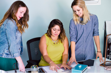 Three women who are planning an event