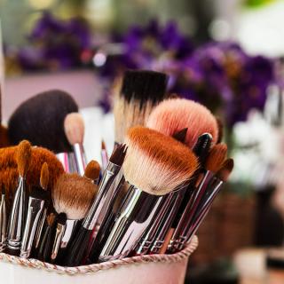 Makeup brushes in a cup
