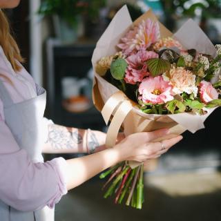 Woman holding a bouquet of flowers